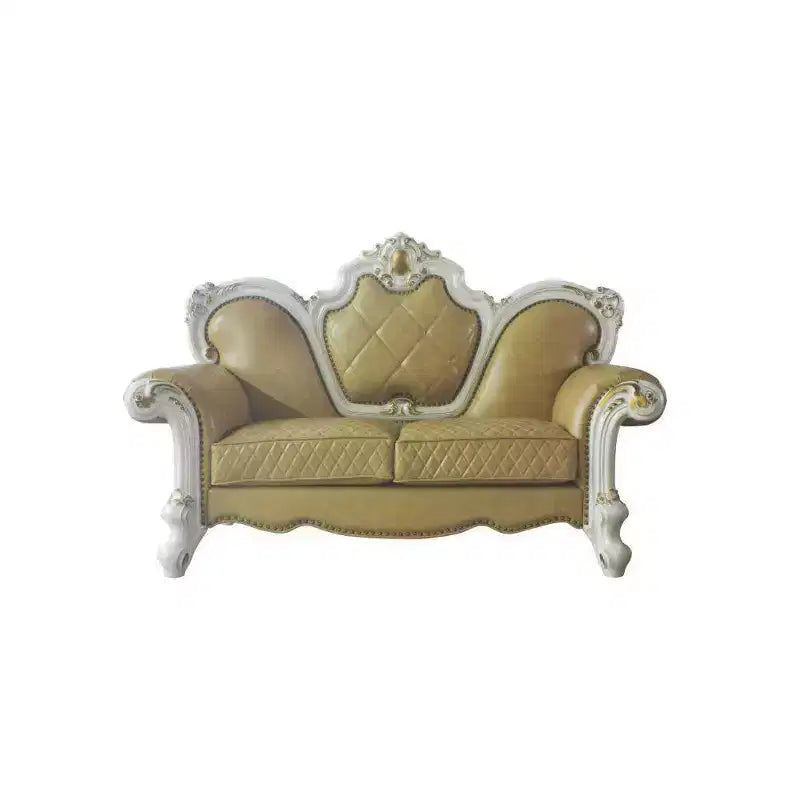 Tufted Loveseat with Carved Frame and Accent Pillows